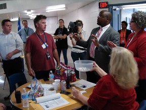 Solomon Graves, right, explains to members of the media the ground rules for selecting media witnesses for the scheduled execution of Kenneth Williams at the Cummins Unit prison at Varner, Ark., Thursday, April 27, 2017. Three media witnesses are allowed.