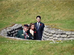 Photo of the day: Canadian Prime Minister Justin Trudeau and wife Sophie Gregoirenvisit the Canadian National Vimy Memorial in Vimy, near Arras, northern France, on April 9, 2017, during a commemoration ceremony to mark the 100th anniversary of the Battle of Vimy Ridge. The World War I battle was a costly victory for Canada, but one that helped shape the former British colony's national identity.