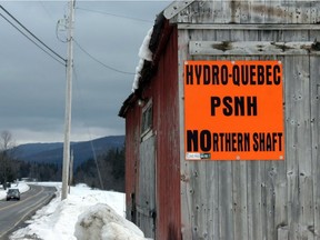 The proposed Northern Pass transmission line through northern and central New Hampshire has generated widespread opposition. Protest signs, such as this one outside of Colebrook, have become commonplace.