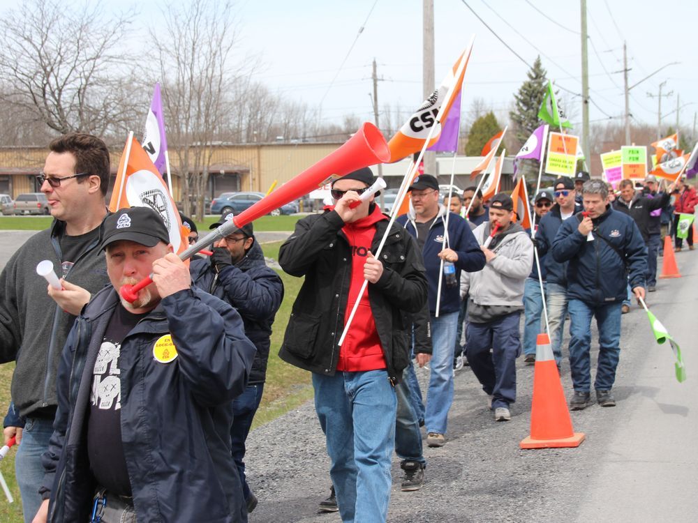 Warehouse workers from Laval came to Cornwall on Tuesday to protest a back-<a href=