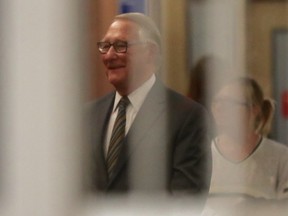 Former Montreal mayor Gérald Tremblay walks through the Palais de Justice in Montreal on Monday, May 1, 2017 before testifying at the Contrecoeur trial.