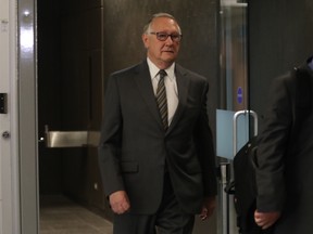 Former Montreal mayor Gérald Tremblay walks through the Palais de Justice in Montreal on Monday, May 1, 2017 before testifying at the Contrecoeur trial.