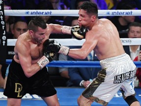 David Lemieux, left, hits Marcos Reyes with a left in the fourth round of their middleweight bout on May 6, 2017 in Las Vegas, Nevada. Lemieux won by unanimous decision.