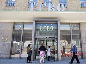 TORONTO, ONTARIO: MAY 16, 2013-- L.C.B.O. STRIKE? -- Employees enter the LCBO's Queens Quay head offices location in Toronto, Thursday May 16, 2013. The LCBO is negotiating with it's union to avoid a possible strike. [Peter J. Thompson/National Post] [For Toronto story by /Toronto] //NATIONAL POST STAFF PHOTO ORG XMIT: POS1305161304355569 ORG XMIT: POS1305161416516716