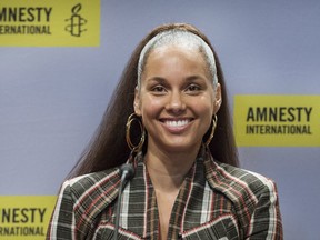 Alicia Keys speaks during a news conference prior to receiving an Ambassador of Conscience Award from Amnesty International recognizing those who have shown exceptional leadership in the fight for human rights in Montreal on Saturday, May 27, 2017.