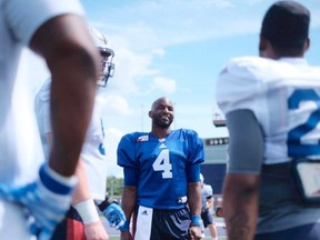 Alouettes quarterback Darian Durant, centre, with his teammates at training camp in Lennoxville on Sunday, May 28, 2017.