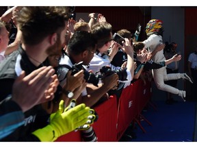 Mercedes' British driver Lewis Hamilton celebrates winning at the Circuit de Catalunya on May 14, 2017 in Montmelo on the outskirts of Barcelona during the Spanish Formula One Grand Prix. /