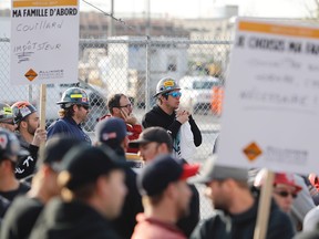 Quebec construction workers walked off the job May 24, 2017. Work schedules and overtime are believed to be at the heart of the conflict.