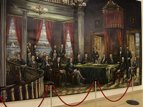 A painting of the Fathers of Confederation hangs in the Holman Grand Hotel in downtown Charlottetown on Friday, Sept. 27, 2013.