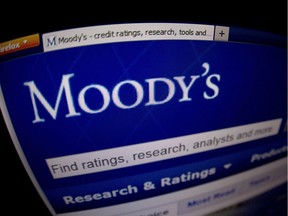 (FILES) This picture taken on January 17, 2012 in Paris shows a close-up of the opening page of the ratings agency Moody's website. Moody's on February 13, 2012 downgraded the debt ratings of Italy, Spain and Portugal and placed negative outlooks on France, Britain and Austria. The ratings agency cited their "susceptibility to the growing financial and macroeconomic risks emanating from the euro area crisis" and uncertainty over institutional reform in the euro area.