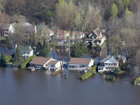 Flooded homes seen from the air along the banks of the Ottawa River on May 11, 2017 in Gatineau.