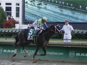 John Velazquez rides Always Dreaming to victory in the 143rd running of the Kentucky Derby horse race at Churchill Downs Saturday, May 6, 2017, in Louisville, Ky.