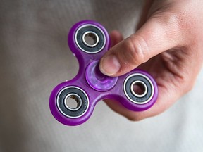 Spinners were born in the 1990s, the brainchild of Florida inventor Catherine Hettinger. After her patent expired in 2005, various companies began to produce spinners, mostly as a therapeutic aid to help autistic or ADHD children to focus.