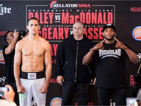 Canadian welterweight Rory MacDonald (left) squares off against Britain's Paul (Semtex) Daley (right wearing Fightlab T-shirt) at a Thursday, May 19, 2017 weigh-in in London, Eng. ahead of Bellator 179 on Friday. Bellator CEO Scott Coker watches from the middle.THE CANADIAN PRESS/ Courtesy of Bellator