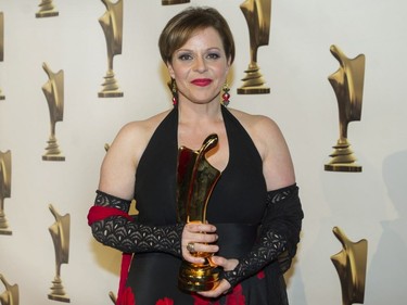 Maude Guerin holds up her award for her role in Feux at the Gala Artis awards ceremony in Montreal, Sunday, May 14, 2017.