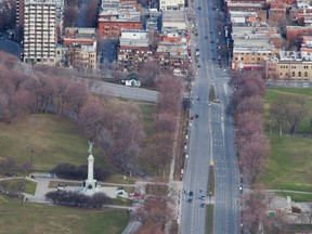 An aerial view of Parc Ave., looking toward the north. There are six sets of traffic lights on Parc from Pine Ave. to Mount Royal Ave., all designed to slow traffic and permit safe pedestrian and cyclist crossings for those getting to and from the mountain.