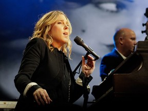 Diana Krall looks out at the crowd during her outdoor blowout at the Montreal International Jazz Festival in 2014.