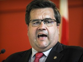 More than a year before he was elected mayor of Montreal, Denis Coderre is alleged to have warned a police officer who was issuing him a ticket that he would be her boss in the future.