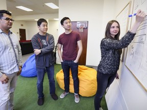 Oohlala CEO Danial Jameel, left, with co-founders Alice Dinu, Peter Cen and James Dang, second from left, at their offices in Montreal.