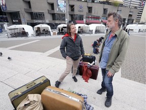 Annie Roy and Pierre Allard, co-founders of ATSA, When art takes action, at Cuisine Ta Ville outside Place des Arts in Montreal Thursday May 11, 2017 where white tents represent refugee camps and where refugees from different countries will be hosting "kitchen parties" telling their stories over soup.