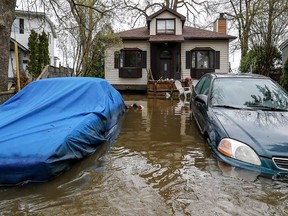 Residents of Ile Mercier are dealing with the flood, on Thursday, May 11, 2017.