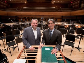 Cantor Gideon Zelermyer, left, and OSM conductor Kent Nagano are seen at the podium in the Maison symphonique in May 2017.