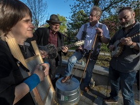 The Hampton Street Coffee Grinders will be playing Porchfest N.D.G. this weekend. Band members Patricia Nellissen (washboard), Michael Dawson (guitar, mandolin and vocals), James Berlyn (washtub bass, kazoo and vocals) and Sean Madden (guitar, mandolin, harmonica, kazoo & vocals) play at Girouard Park in Montreal, on Tuesday, May 16, 2017.