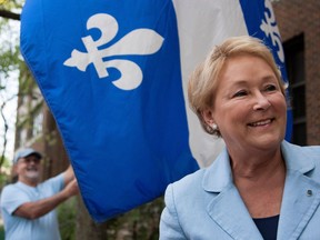 Former Quebec premier Pauline Marois, who used to reside in Ile-Bizard, smiles as she arrives at a gala dinner held as part of Journée nationale des patriotes festivities in 2015.