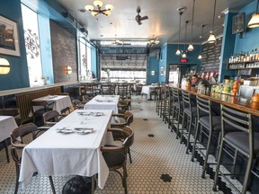 The Monkland Tavern was renovated last year and now features a black and white tile floor and antique light fixtures.