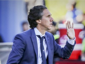 Montreal Impact head coach Mauro Biello calls out to his players during second half of MLS game against the Portland Timbers in Montreal on Saturday May 20, 2017.