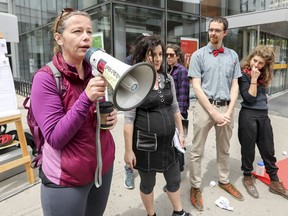 Stéphanie Bellenger-Heng, the Ville-Marie commissioner for the Commission scolaire de Montréal, tries to address issues at Education Across Borders Collective event on Sunday, May 21m 2017 in downtown Montreal highlighting the problems of Quebec's undocumented children.