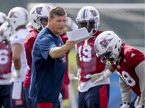 Alouettes' new special teams coach Bruce Read moves players around during training camp at Bishop's University in Lennoxville.