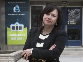 Angela Burgos, head of Centennial Academy, stands outside the school on Thursday May 4, 2017.