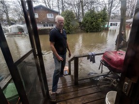 The flooding continues for Île Mercier residents like Robert Kelly on Friday, May 5, 2017. Another two feet and Kelly will have to abandon his home.