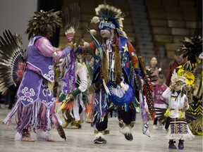 Pow Wow dancers take to the floor in celebration during the Montreal Pow Wow at Verdun Auditorium May 6, 2017.