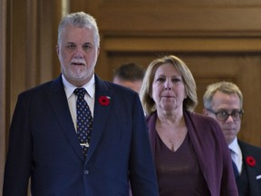 Quebec Premier Philippe Couillard, left, and Christine St-Pierre in September 2016.