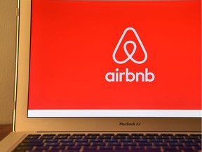The Airbnb logo is displayed on a computer screen on August 3, 2016 in London, England.