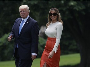 U.S. President Donald Trump and first lady Melania Trump walk on the South Lawn prior to their departure from the White House May 19, 2017 in Washington, DC. President Trump is traveling for his first foreign trip to visit Saudi Arabia, Israel, the Vatican, and attending a NATO summit in Brussels, Belgium and a G7 summit in Taormina, Italy.