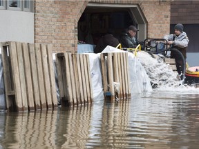 Flooded streets are clearing of water, allowing for the cleanup to begin.