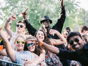 Revellers at Piknic Électronik in 2016. This year, the festival will move from its longstanding spot under Alexander Calder's iconic L'Homme sculpture to a redesigned setup at the greener Plaine des jeux, also on Île Ste. Hélène.