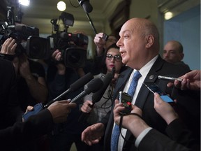 Quebec government MNA Robert Poeti responds to reporters questions over a rumour over candidates in his riding for the next provincial election, Tuesday, May 2, 2017 at the legislature in Quebec City.