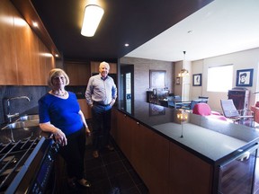 Roz Holden, 72, and her husband Bob Holden, 73, pose for a photograph in their condo in Toronto on Thursday April 27, 2017. The Holdens downsized to a condo after living in a five bedroom detached house.