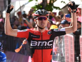 Tejay van Garderen, of the United States, celebrates as he crosses the finish line to win the 18th stage of the Giro d'Italia, Tour of Italy cycling race, from Moena to Ortisei, May 25, 2017.