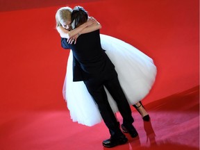 Photo of the day: Australian actress Nicole Kidman hugs her husband, Australian country singer Keith Urban, as they leave the Festival Palace on May 22, 2017, following the screening of the film The Killing of a Sacred Deer at the 70th edition of the Cannes Film Festival.