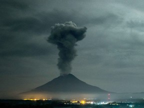 Photo of the day: Mount Sinabung volcano spews thick volcanic ash as seen from Beganding village in Karo on early May 2, 2017. Sinabung roared back to life in 2010 for the first time in 400 years. After another period of inactivity it erupted once more in 2013, and has remained highly active since.