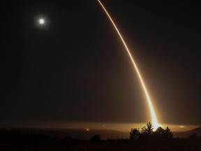 Photo of the day: Beautiful destruction — A streak of light trails off into the night sky as the U.S. military test fires an unarmed intercontinental ballistic missile (ICBM) at Vandenberg Air Force Base in California, May 3, 2017. /