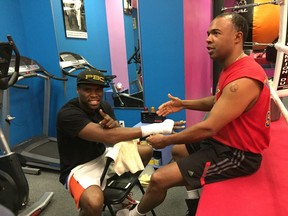 WBC light-heavyweight champion Adonis Stevenson and his trainer, Javan  Hill, during workout on Thursday, May 11, at Gymnase Adonis Stevenson in Montreal. Stevenson will attempt to defend his title on June 3 at the Bell Centre.
Credit: Herb Zurkowsky Montreal Gazette