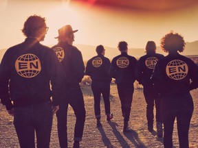 Arcade Fire posted a photo to Instagram of the band wearing "Everything Now" jackets.