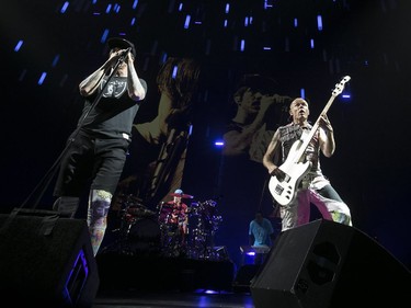 Red Hot Chili Peppers' Anthony Kiedis, left, Chad Smith, drums, and Flea at the Bell Centre in Montreal on Tuesday June 20, 2017.