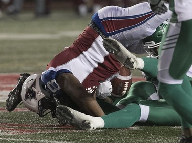 Montreal Alouettes' Nik Lewis fumbles football during fourth quarter action against the Saskatchewan Roughriders in Montreal on Thursday June 22, 2017.